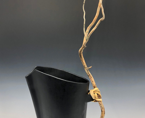 Pitcher with Stick Handle